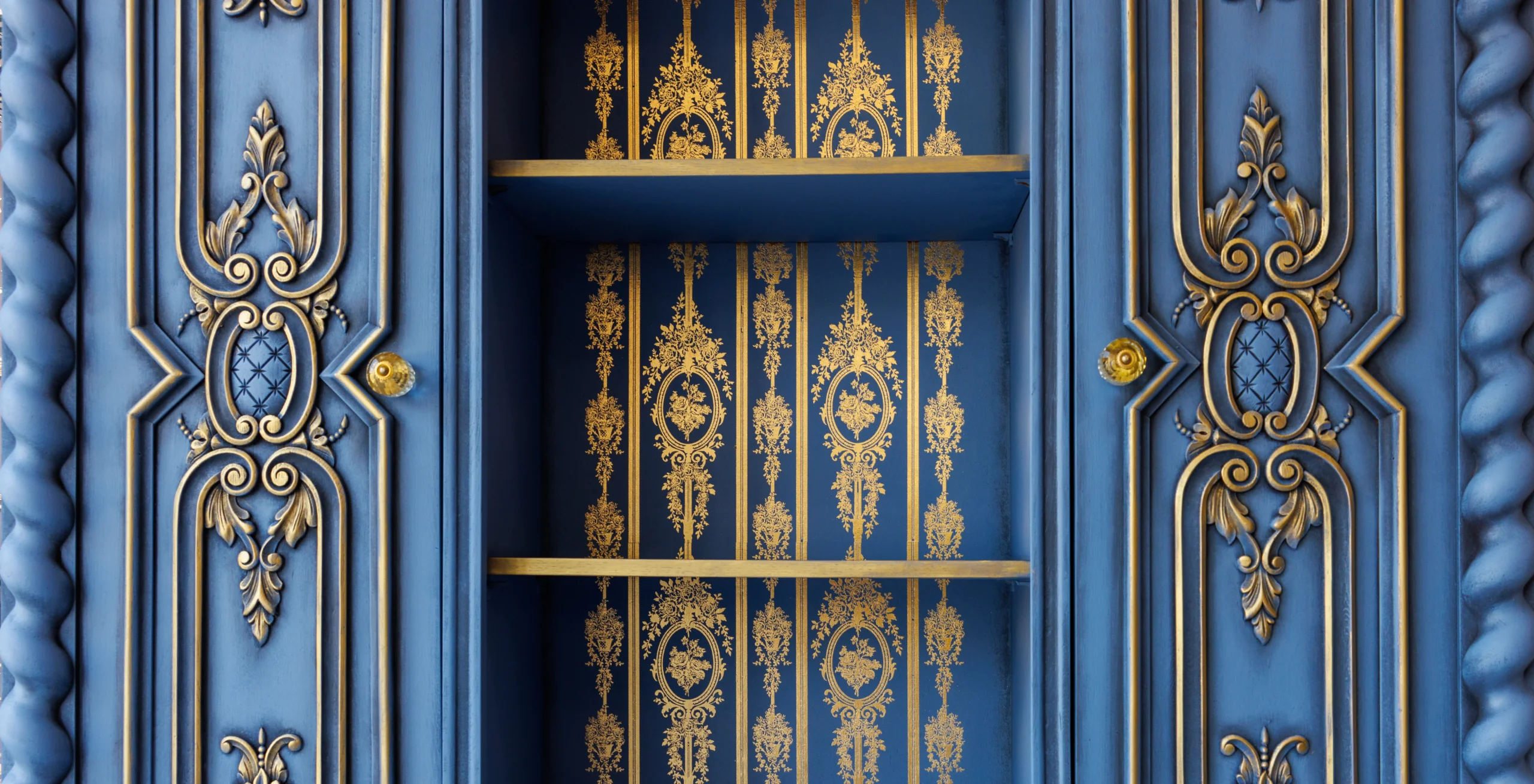 Chateau Filigree gold foil transfer on a blue cabinet